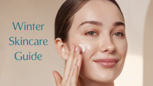 Woman applying face moisturizer on glowing skin with text overlay reading 'Winter Skincare Guide' - demonstrating proper winter skincare technique